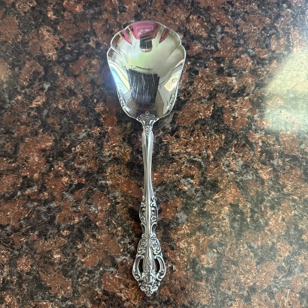 Oneida MICHELANGELO Stainless Solid Shell Casserole Spoon 8 3/4